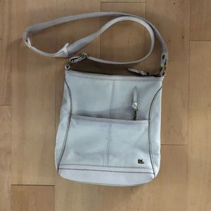 The Sak cream colored cross body bag.  New, never used